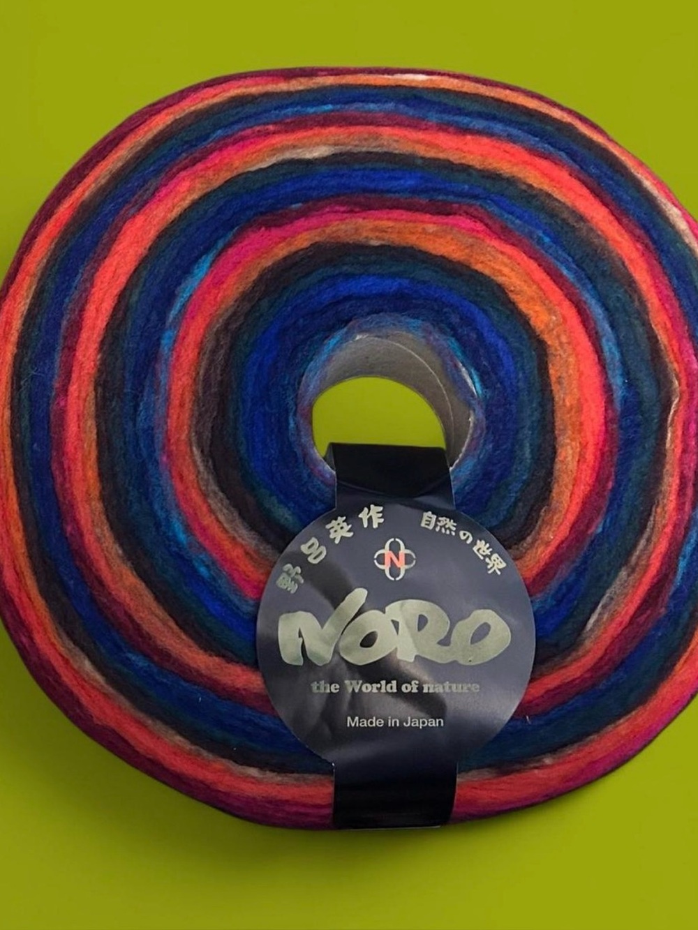 Brand new Noro Rainbow Roll Colorway 1024 unspun pencil roving made of 100% wool